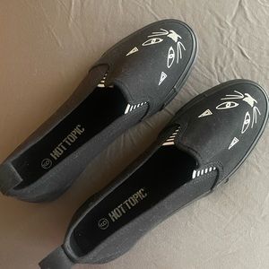 Black cat slip ons